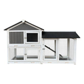 Outdoor wooden rabbit hutch with removable tray, running cage, and spacious design for small animals.